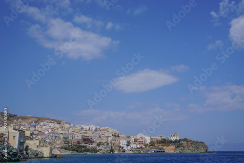 Hermoupolis, Syros, Greece: View from the breakwater of a cloud formation over the coast of Syros, a Cyclades Island in Greece.
