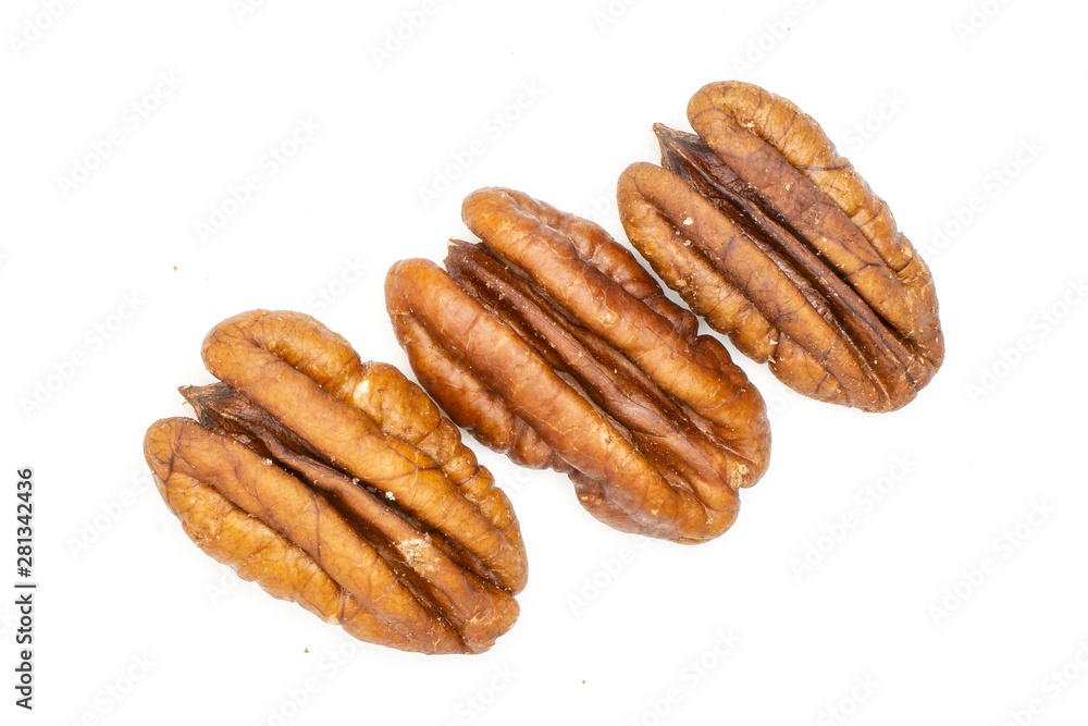 Group of three whole unshelled fresh brown pecan nut half flatlay isolated on white background Group of three whole unshelled fresh brown pecan nut half flatlay isolated on white background