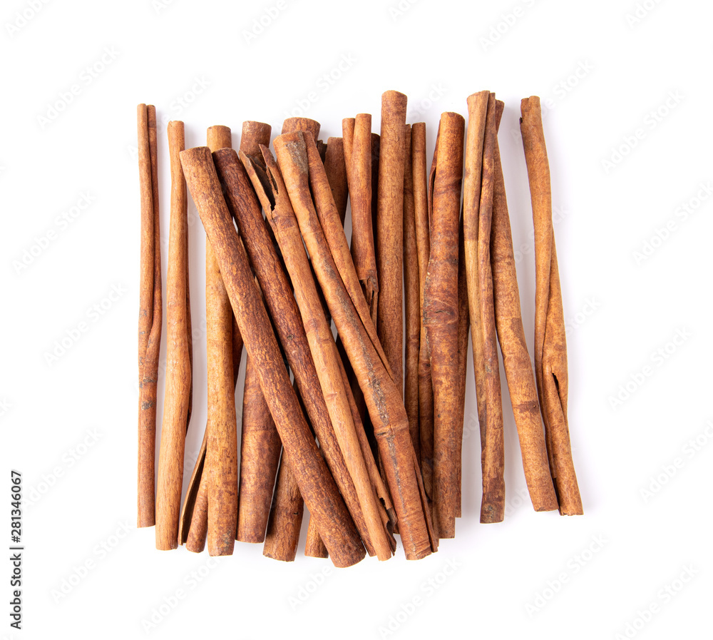 Cinnamon sticks isolated on white background. Top view Cinnamon sticks isolated on white background. Top view