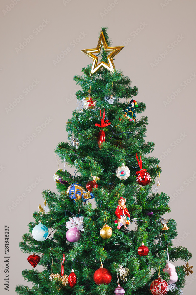 Christmas tree with gold star and decorations