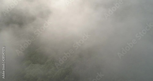 Flying in the fog to the volcano Kronotsky photo