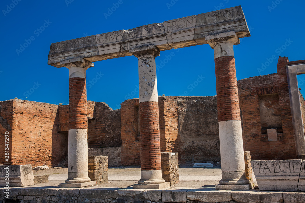 Ruins of the Forum at the ancient city of Pompeii in a beautiful early spring day Ruins of the Forum at the ancient city of Pompeii in a beautiful early spring day