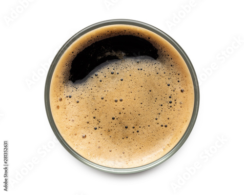 Glass of dark stout beer top view with foam. Isolated on white background. with clipping path.