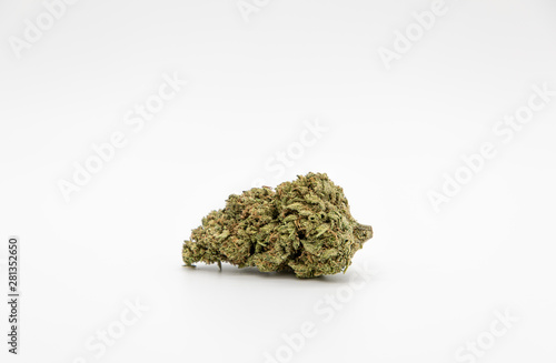 Single marijuana bud on white background