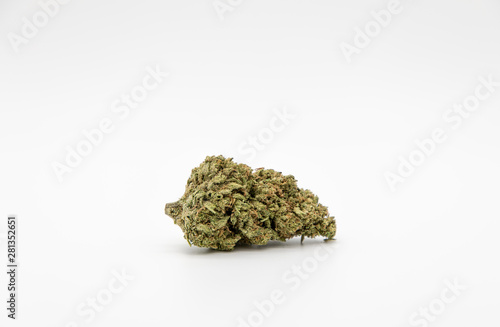 Single marijuana bud on white background