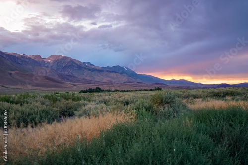 Mountain range colorful sunset with clouds before storm , Eastern Sierra Mountains, Mono County, California, USA