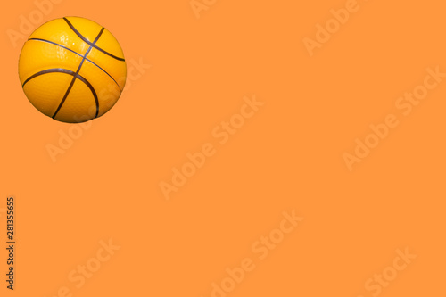 Basketball isolated on orange background