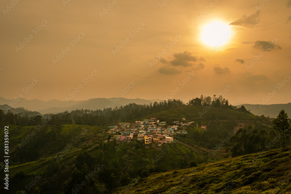 small village on hill top with green forest of western ghat