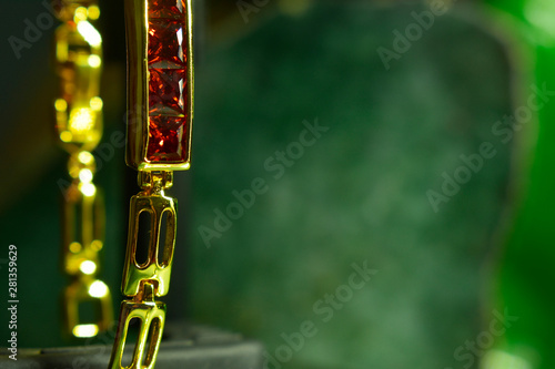 Ruby bracelet Is genuine gold and decorated with precious and expensive gems