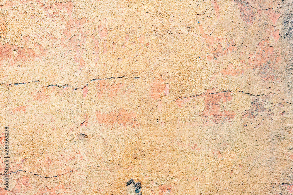Texture of a concrete wall with cracks and scratches which can be used as a background Texture of a concrete wall with cracks and scratches which can be used as a background