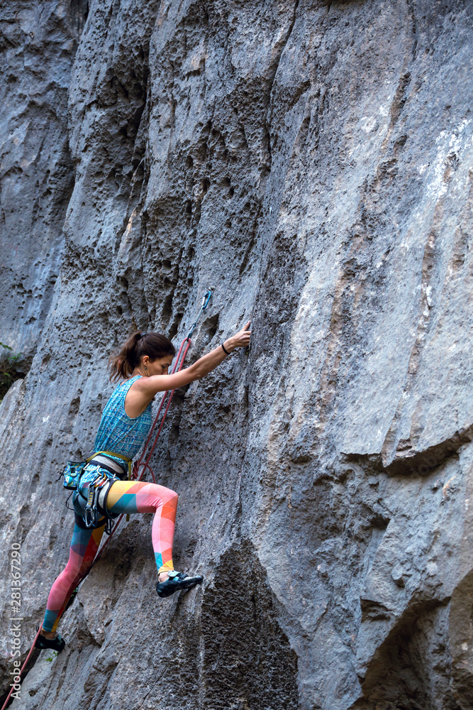 Woman engaged in extreme sport. Woman engaged in extreme sport.