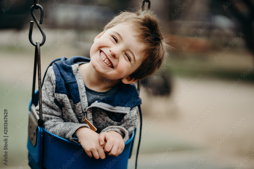 Portrait of a happy little boy at the playground Portrait of a happy little boy at the playground
