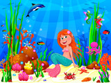Cute joyful little mermaid in the underwater world. The little mermaid underwater among sea creatures and underwater plants