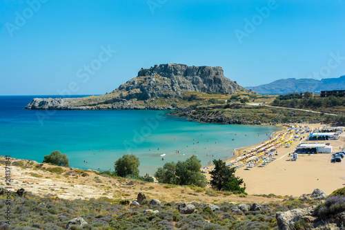 Fototapeta Naklejka Na Ścianę i Meble -  Agathi Beach Rhodes Greece Europe. Panorama with rocks golden sand and clear blue water