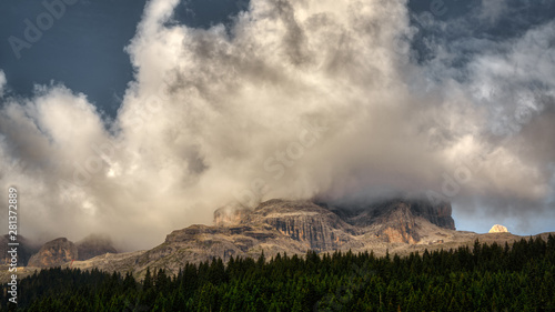 Storm clouds overthe group of Sella, Dolomiti, Italy photo