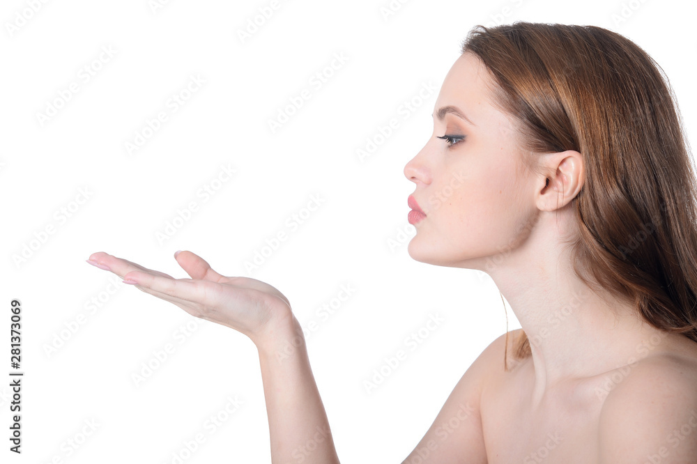 Portrait of beautiful young woman posing isolated on white background Portrait of beautiful young woman posing isolated on white background