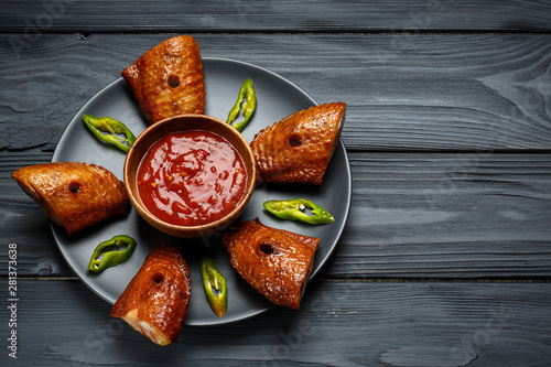 smoked chicken wings on a g...