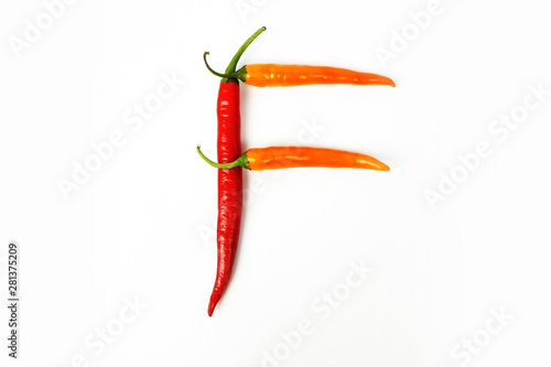 English alphabet. Letter F made of fresh chili pepper isolated on white background. Uppercase letter.