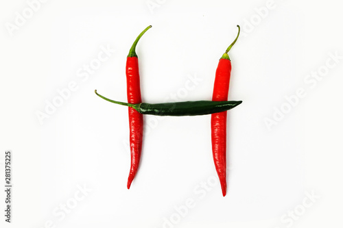 English alphabet. Letter H made of fresh chili pepper isolated on white background. Uppercase letter.