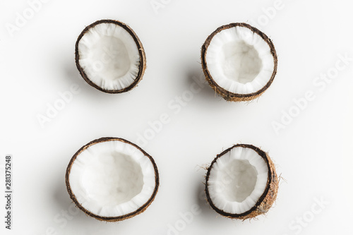 Ripe coconut pieces on white background, copy space