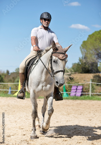 riding man and horse © cynoclub