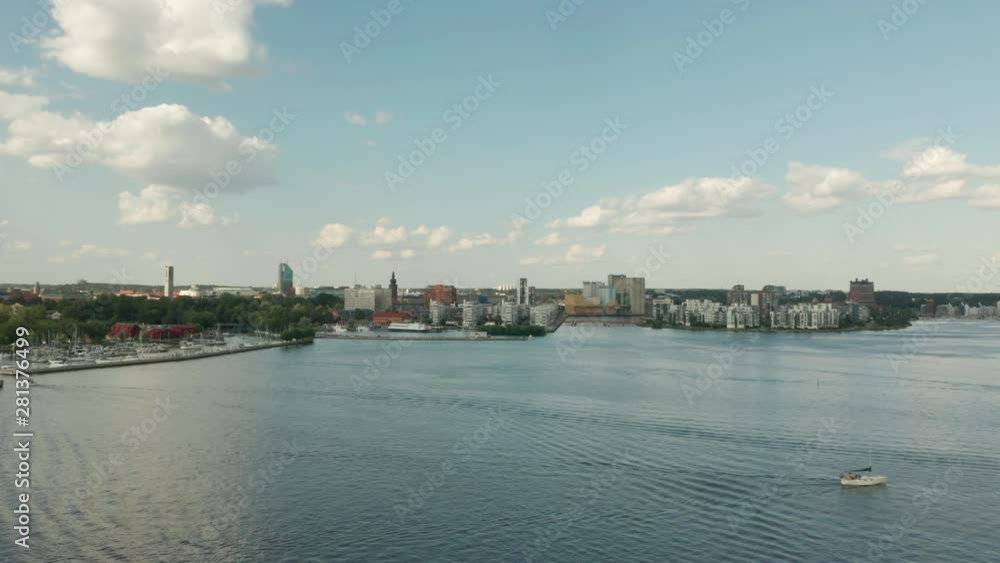 Aerial video Vasteras skyline. Forward drone movement over lake Malaren toward city center. Aerial video Vasteras skyline. Forward drone movement over lake Malaren toward city center.