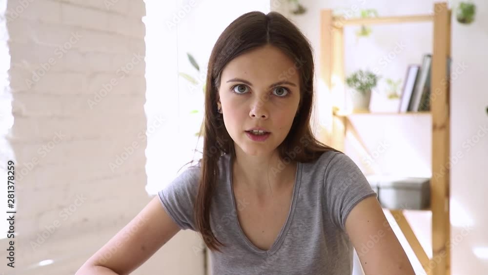 Woman makes video call talking looking at web camera Woman makes video call talking looking at web camera