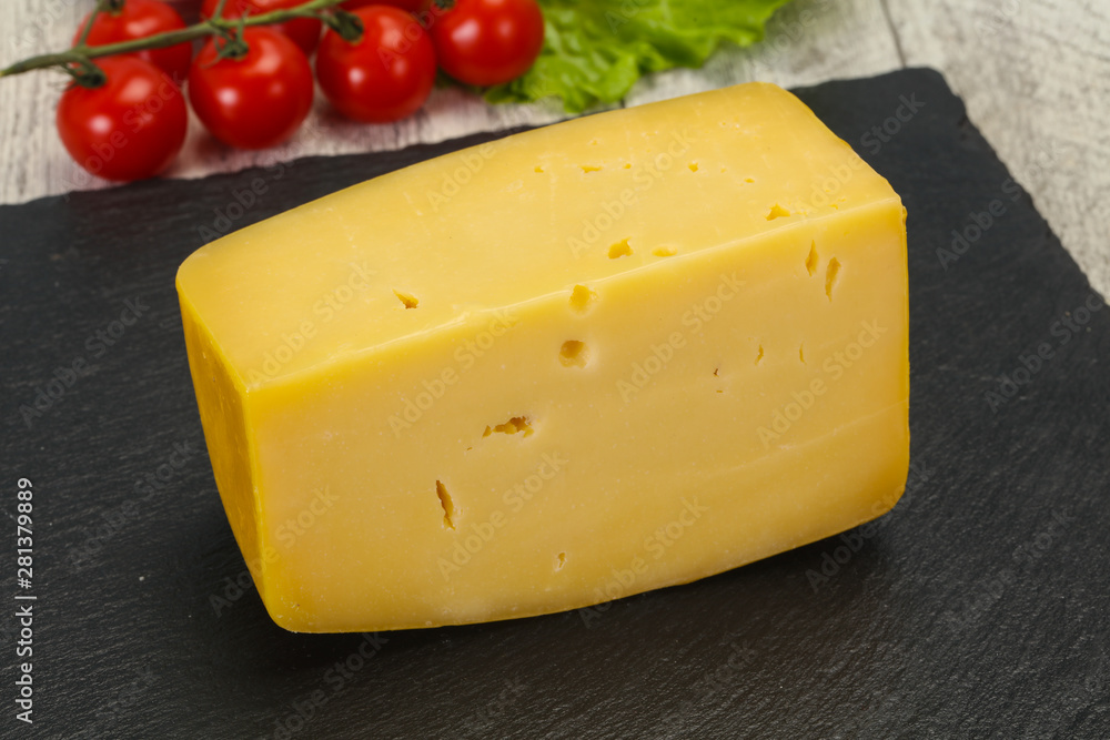 Hard yellow tasty cheese brick Hard yellow tasty cheese brick