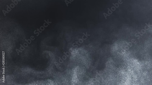 A strange, dense plume of dark particles descends and spreads out