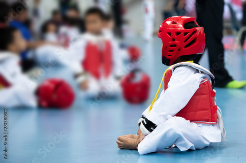Business Man in Blue dark suit with case bag play send message on smart phone via social media while waiting for meeting