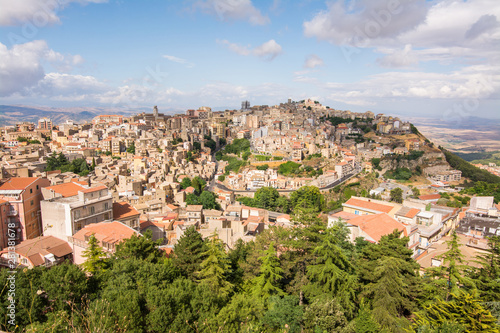 Panoramic aerial view of Enna old town, Sicily, Italy. Enna city located at the center of Sicily and is the highest Italian provincial capital © puckillustrations