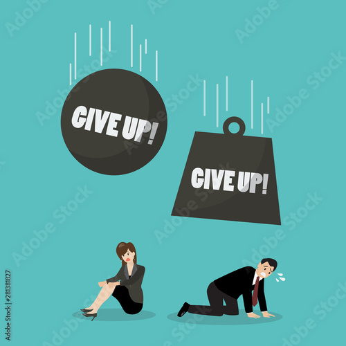 Heavy balls with word give up falling to desperate businessman and woman