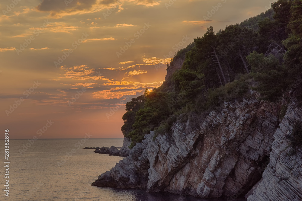 Sunset, sea view and rocks. Montenegro, Adriatic sea