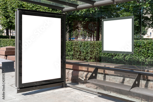 Canvas Print Mock up lightbox and square banner on wall bus stop on street in city