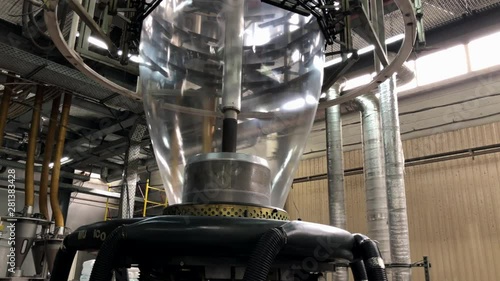 footage of plastic and flexible polymer packaging production; modern machinery and equipment; ocean pollution, production of waste, consumerism concept; waste recycling and reusability