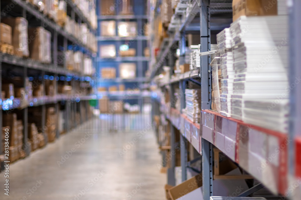 Blurred warehouse with goods. Business logistics distribution, storage of cargo, concept. Blurred warehouse with goods. Business logistics distribution, storage of cargo, concept.