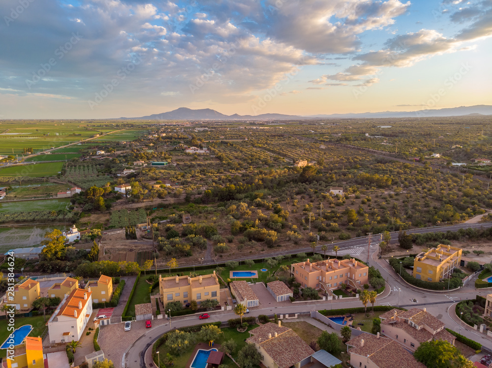 The sunset over L'Ampolla, Catalonia, Spain. Drone aerial photo