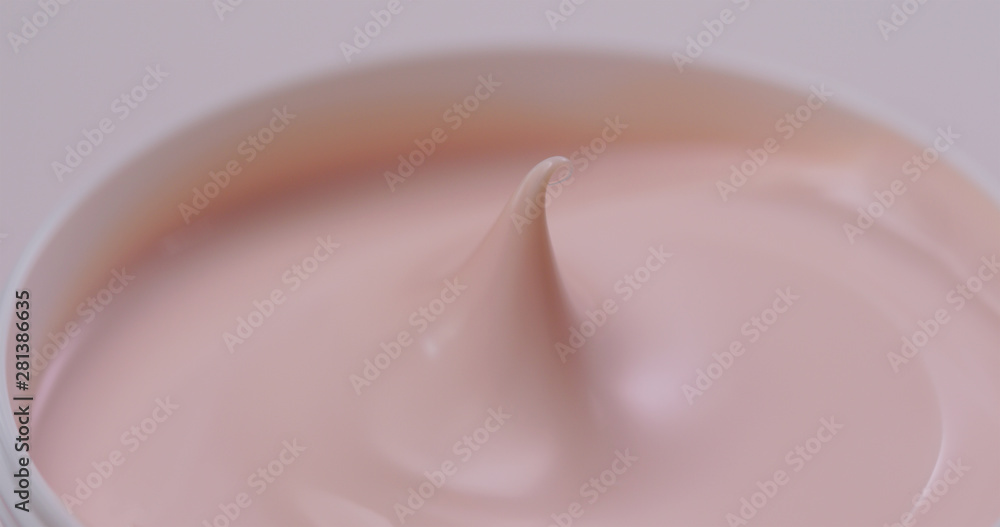 Closeup shot of pink cosmetics cream Closeup shot of pink cosmetics cream