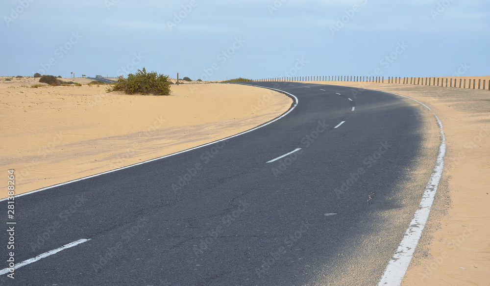 Road Crossing El Corralejo Dunes Natural Park in Fuerteventura. Canary Islands Road Crossing El Corralejo Dunes Natural Park in Fuerteventura. Canary Islands