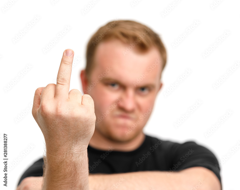 Aggressive man with blurred face showing fuck off sign with the middle finger isolated white background. conflict Aggressive man with blurred face showing fuck off sign with the middle finger isolated white background. conflict