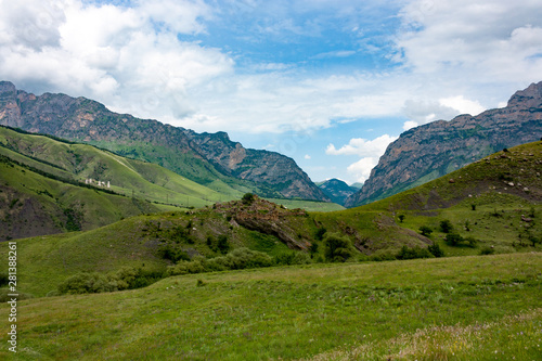 Landscape with mountains and clouds in Northern Caucasus © Denis Glagazin
