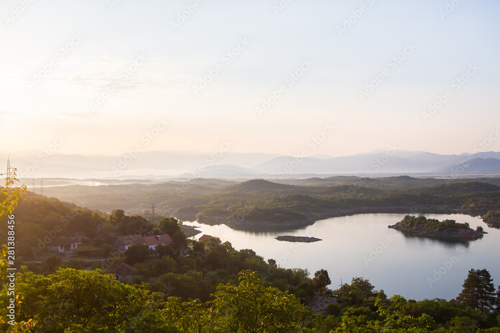 Sunrise nature landscape, Slano lake (Slansko jezero) in Montenegro near Niksic, scenic panoramic aerial view