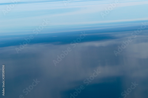 Water surface. View of a Crystal clear sea water texture. Landscape. Small waves. Water reflection