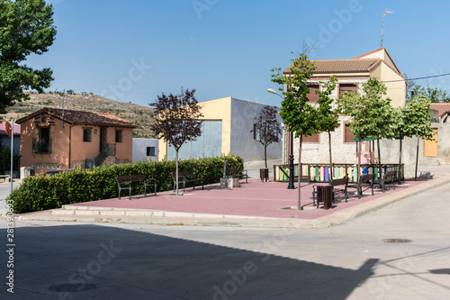 town square with benches and trees © photointruder