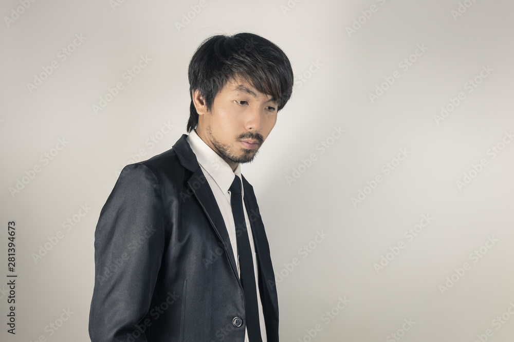 Portrait Businessman in Black Suit Fashion Side View in Vintage Tone Portrait Businessman in Black Suit Fashion Side View in Vintage Tone