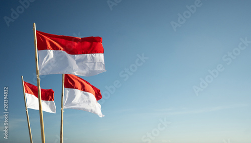 indonesia flags under blue sky independence day concept photo