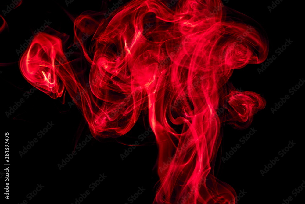 Obraz premium Red smoke on black background
