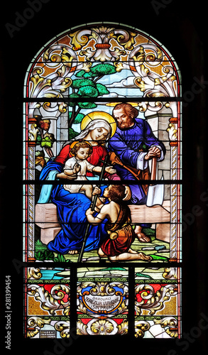 Holy Family with St. John the Baptist  stained glass window in the Saint John the Baptist church in Zagreb  Croatia