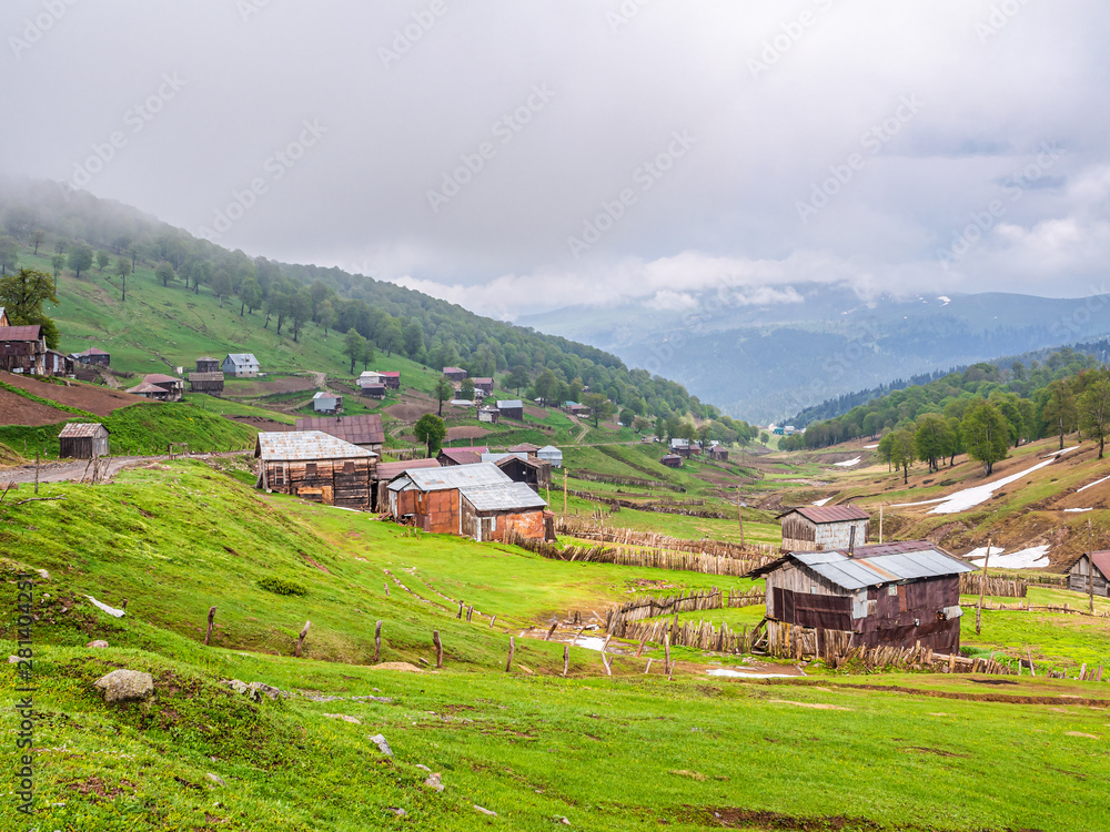 Beautiful landscape in Georgia with shabby cabins of Goderdzi pass