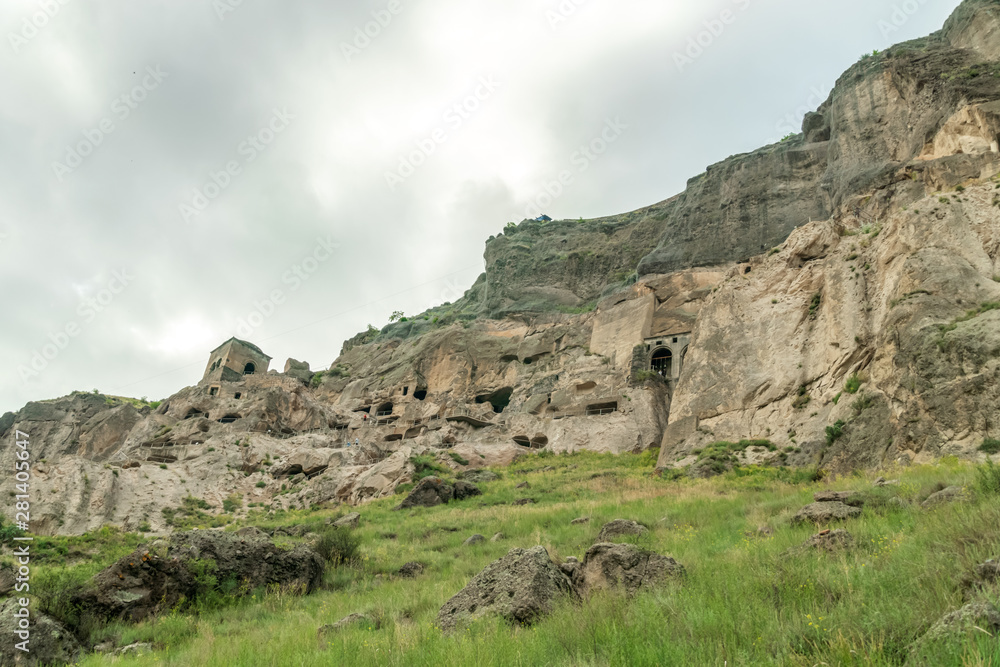 View of the Vardzia caves against the sky with clouds. Vardzia is a cave monastery in southern Georgia